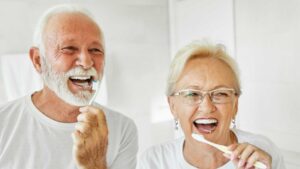 Dental Implants vs Dentures: Which Choice Will Improve Your Life?